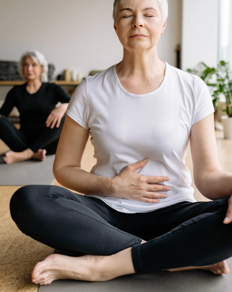 senior woman meditates her excercise